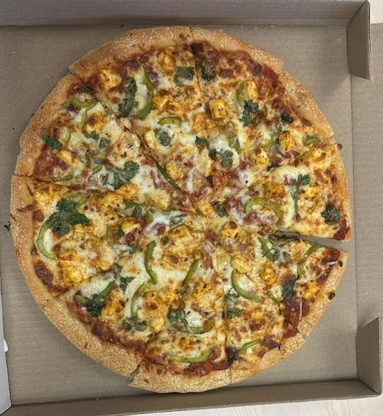 Delicious Alfredo Chicken Pizza at YROC Pizza in Innisfail, AB